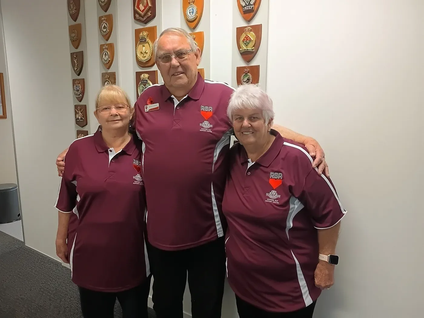 Tricia, Duncan and Lyn wearing their new maroon Western BOP Support Centre shirts